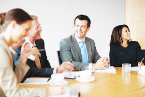 Smiling people in a meeting