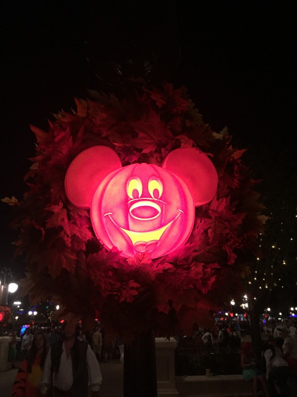 Mickey Mouse glowing face on a pumpkin