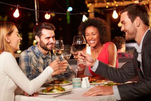 friends enjoying dinner together