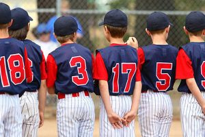 young boys baseball team standing